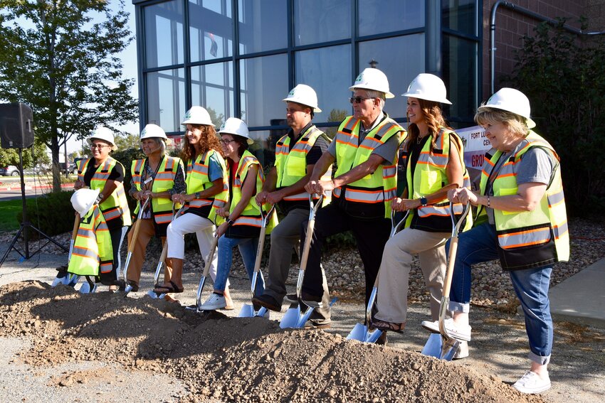 The Recreation Center staff celebrates with shovels of the renovation of the recreation center to better serve the community.